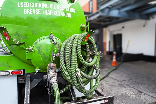 large truck pumping grease trap at a restaurant in Bridgewater, NJ